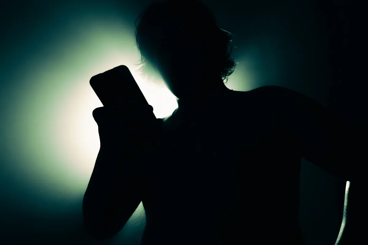 High-resolution photo of an adult using a smartphone