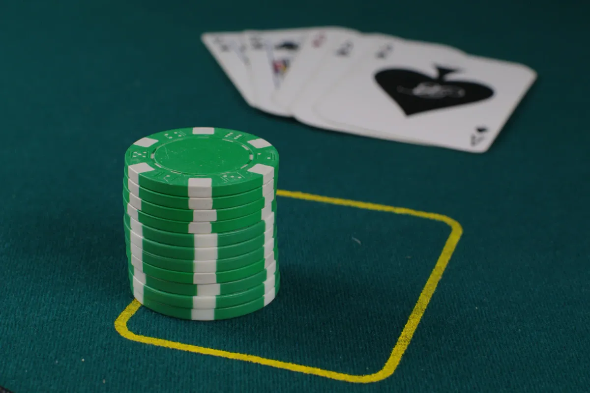 High-resolution real poker chips and cards accompanying the responsible play limits section